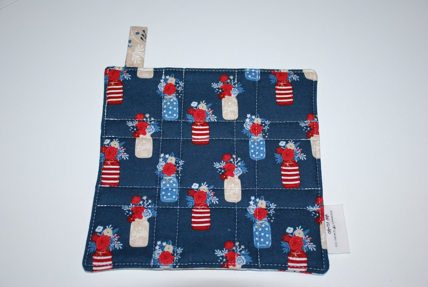 Main Street Parade Hot Pad Navy Vases