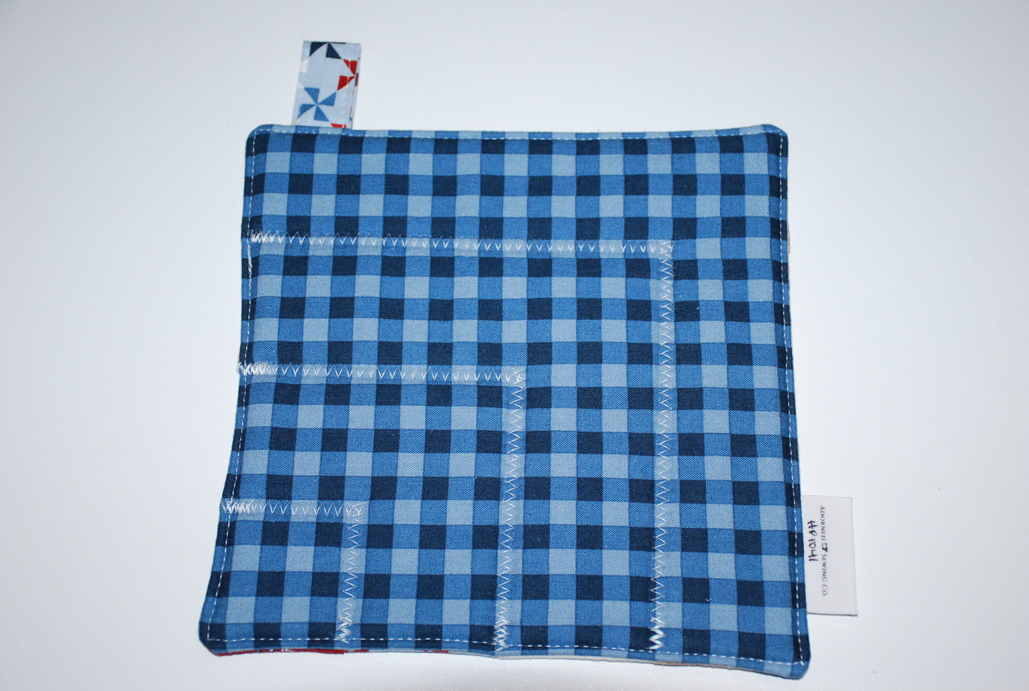 Main Street Parade Hot Pad Navy Checkers