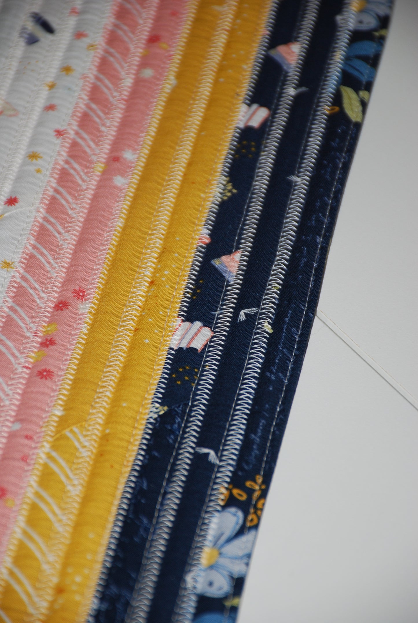 Between the Pages Jelly Roll Rug