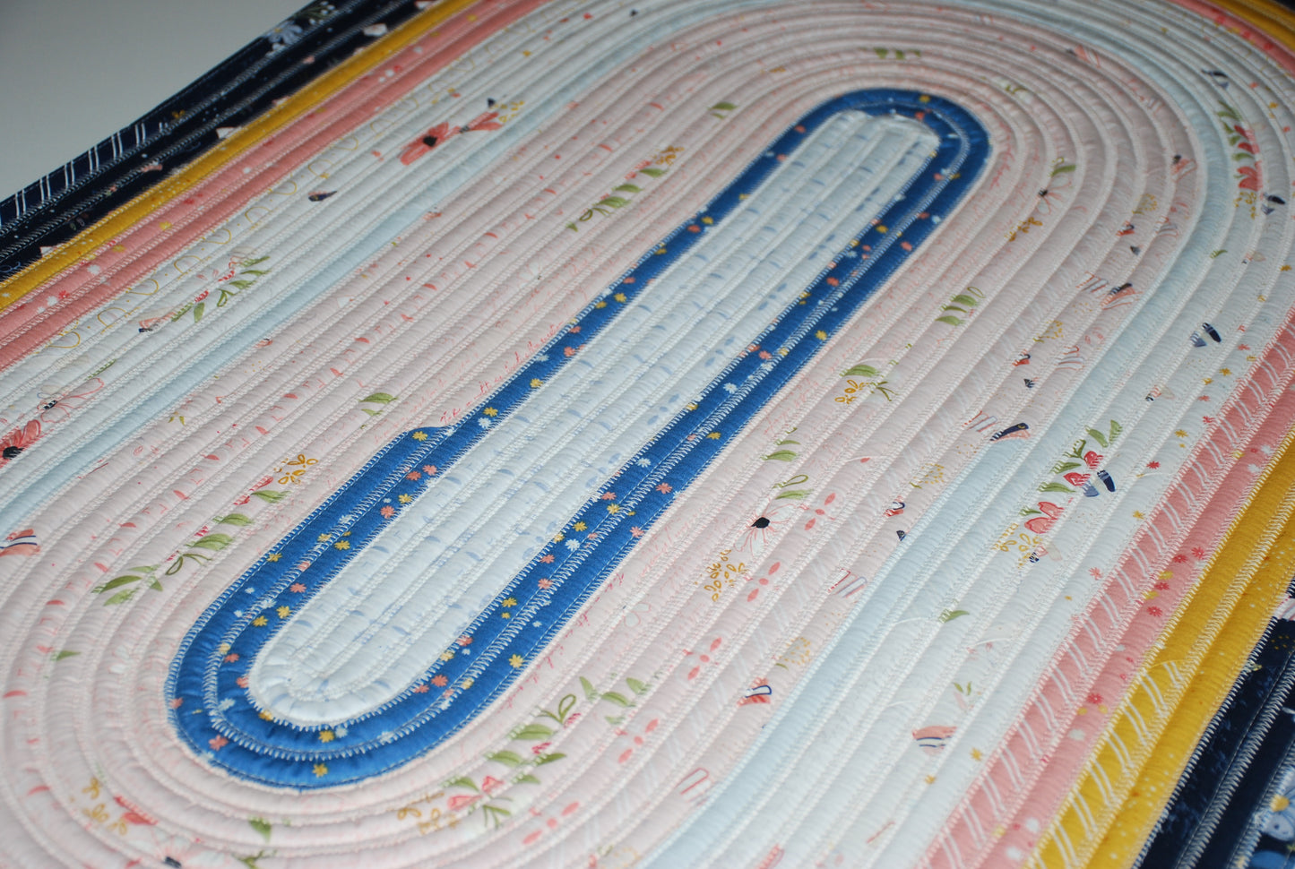 Between the Pages Jelly Roll Rug