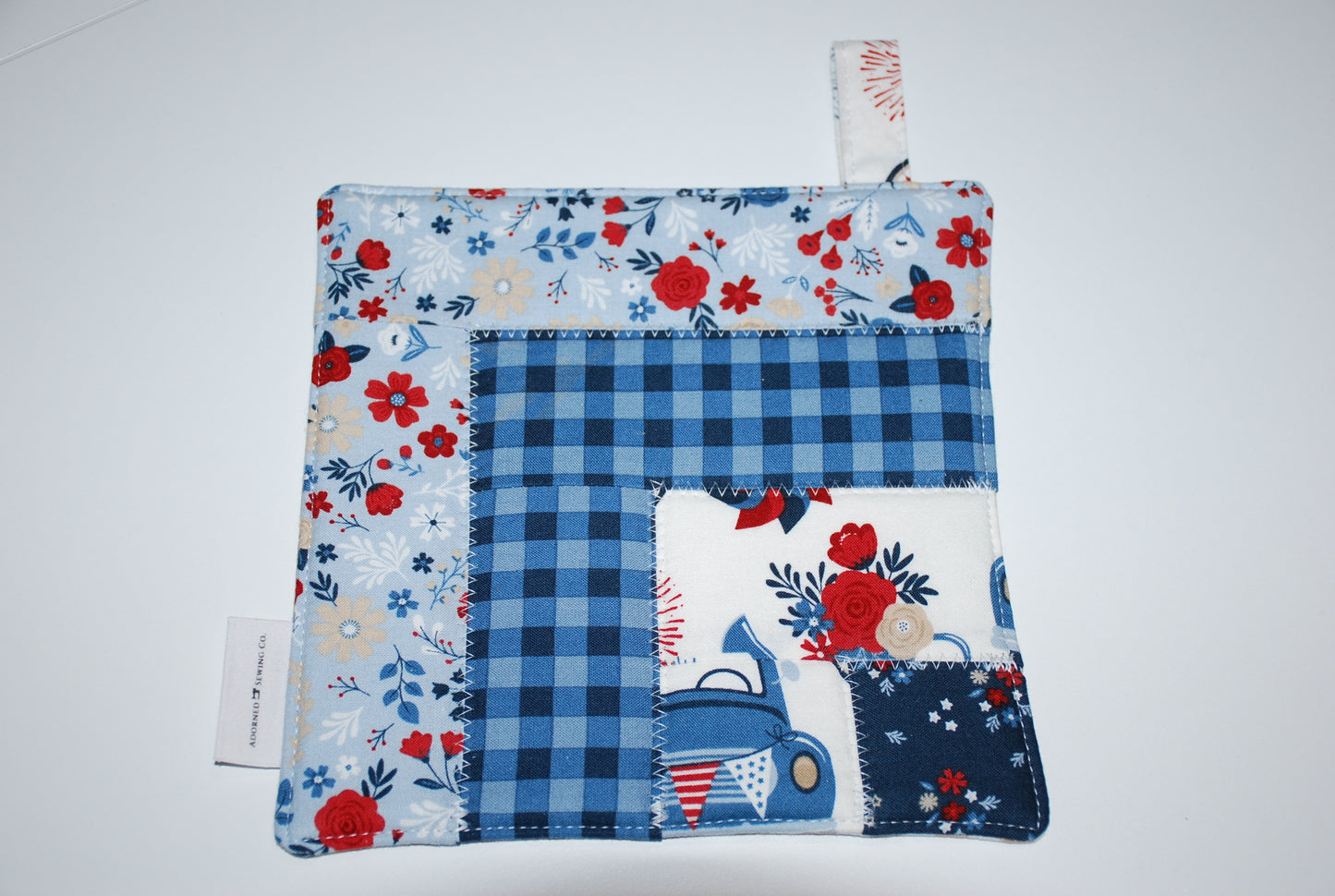 Main Street Parade Hot Pad Tan Checkers