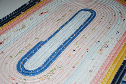 Between the Pages Jelly Roll Rug